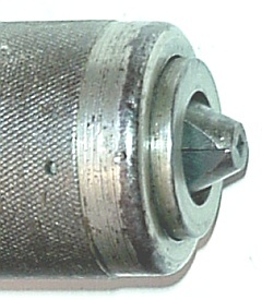 Drilled hole for disassembling chuck bearings