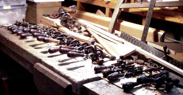 a bench full of early Millers Falls eggbeater drills